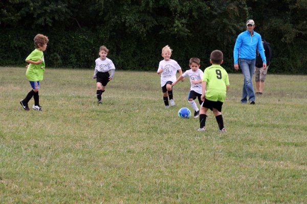 Nick dribbles the ball